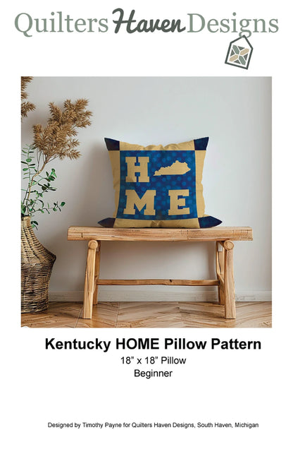 A blue and yellow Kentucky HOME pillow made with Checker Distributor's Beginner Sewing Pattern rests on a wooden bench near a wicker vase. Text reads: Kentucky HOME Pillow Pattern, 18x18 Pillow, Beginner.
