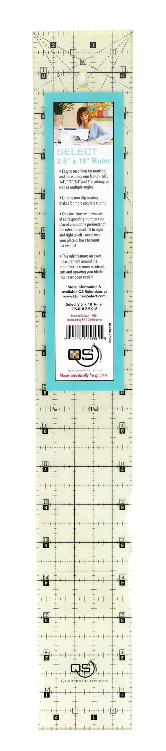 A clear plastic Checker Distributor Quilters Select Non-Slip Ruler (2-1/2in x 18in) features black gridlines, numbers, and a blue label with product info, barcode near the top, and instructions visible on the label.