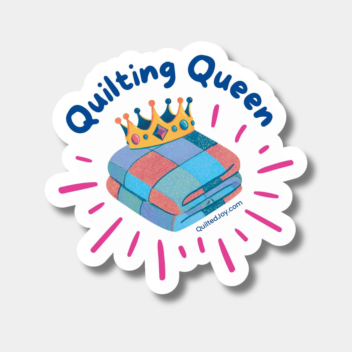 The Quilting Queen Sticker from Checker Distributor features “Quilting Queen,” a vibrant folded quilt, jeweled crown, and pink accents—ideal for quilters or adding flair to your sewing machine.