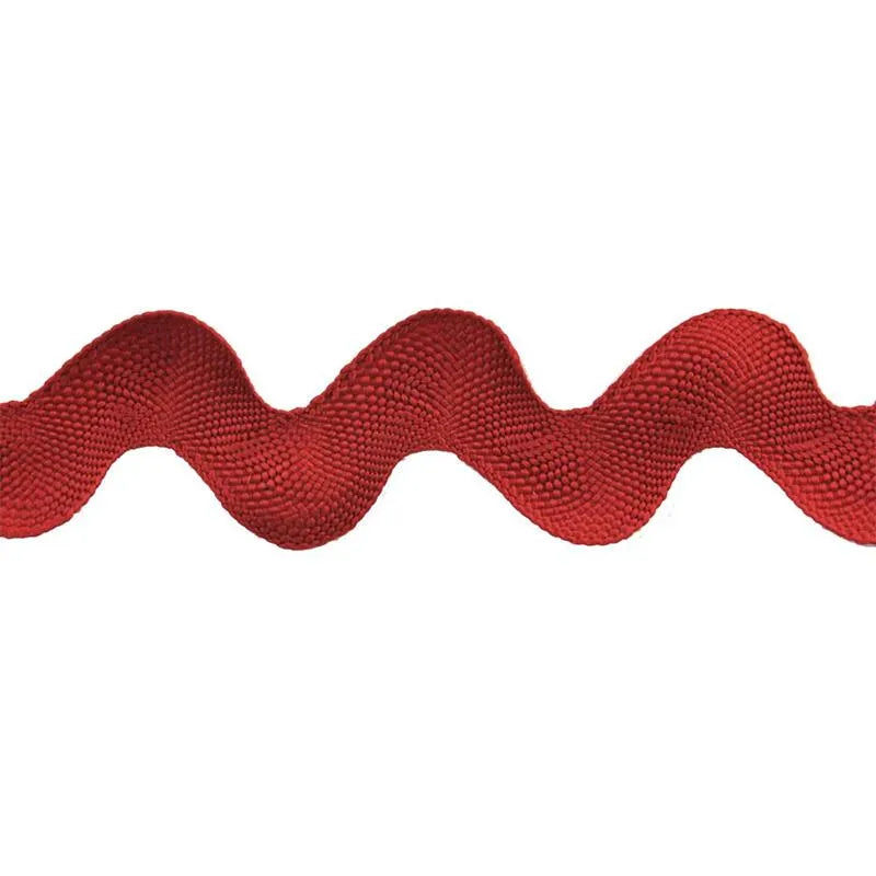 A close-up of Rick Rack 1-1/4" Wide red polyester trim with a wavy zigzag pattern on a white background—ideal as a sewing embellishment.