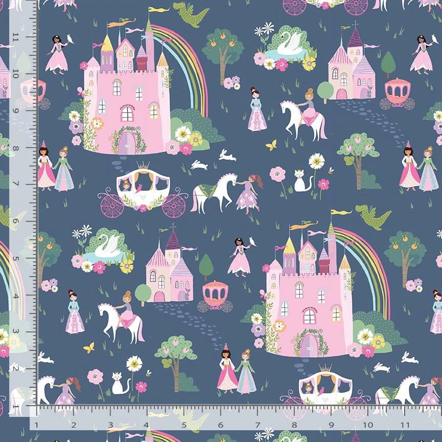 Dear Stella Enchanted Bijou Castles Fabric Yardage features pink castles, princesses, unicorns, carriages, rainbows, trees, flowers & dragons on blue. Rulers along the sides indicate scale.