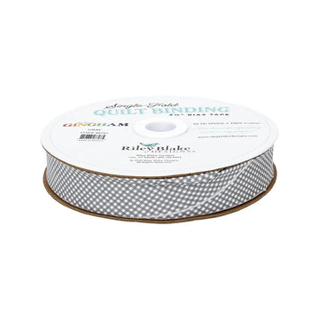 A spool of Riley Blake Micro Gingham Gray 2.5" Bias Quilt Binding, made from 100% cotton, with branded labeling.