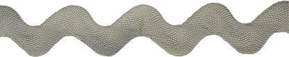 A close-up of Rick Rack 1-1/4" Wide in light gray, featuring a wavy zigzag pattern on a white background—ideal as polyester trim or sewing embellishment for creative projects.