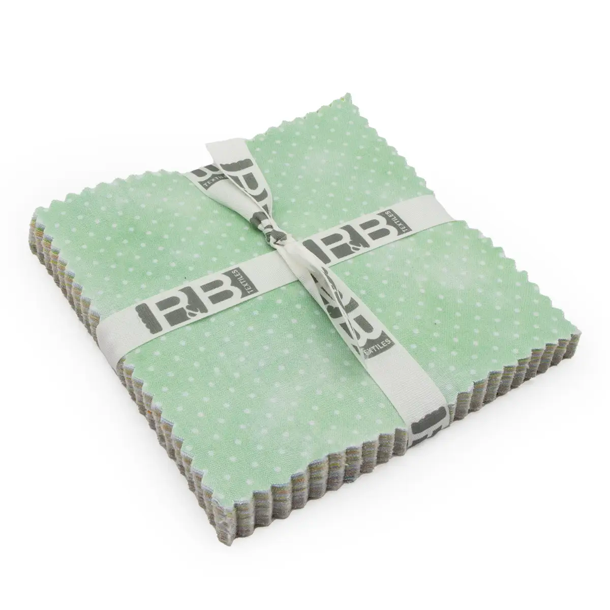 A neatly stacked bundle of Sorbet 5" Charm Packs, featuring green fabric squares with white polka dots, perfect for quilting, tied with a white ribbon printed with the letters RB in black.