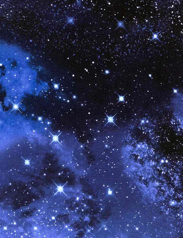 Stars and a glowing nebula create a mesmerizing celestial scene, just like the Galaxy 108" Wide Quilt Backing Fabric.