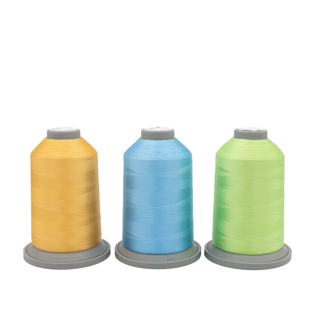 Three large spools of Hab+Dash by Fil Tec thread in yellow, blue, and light green stand upright on gray bases against a white background—ideal for your Sugar Stitches Glide Thread of the Month Bundle.