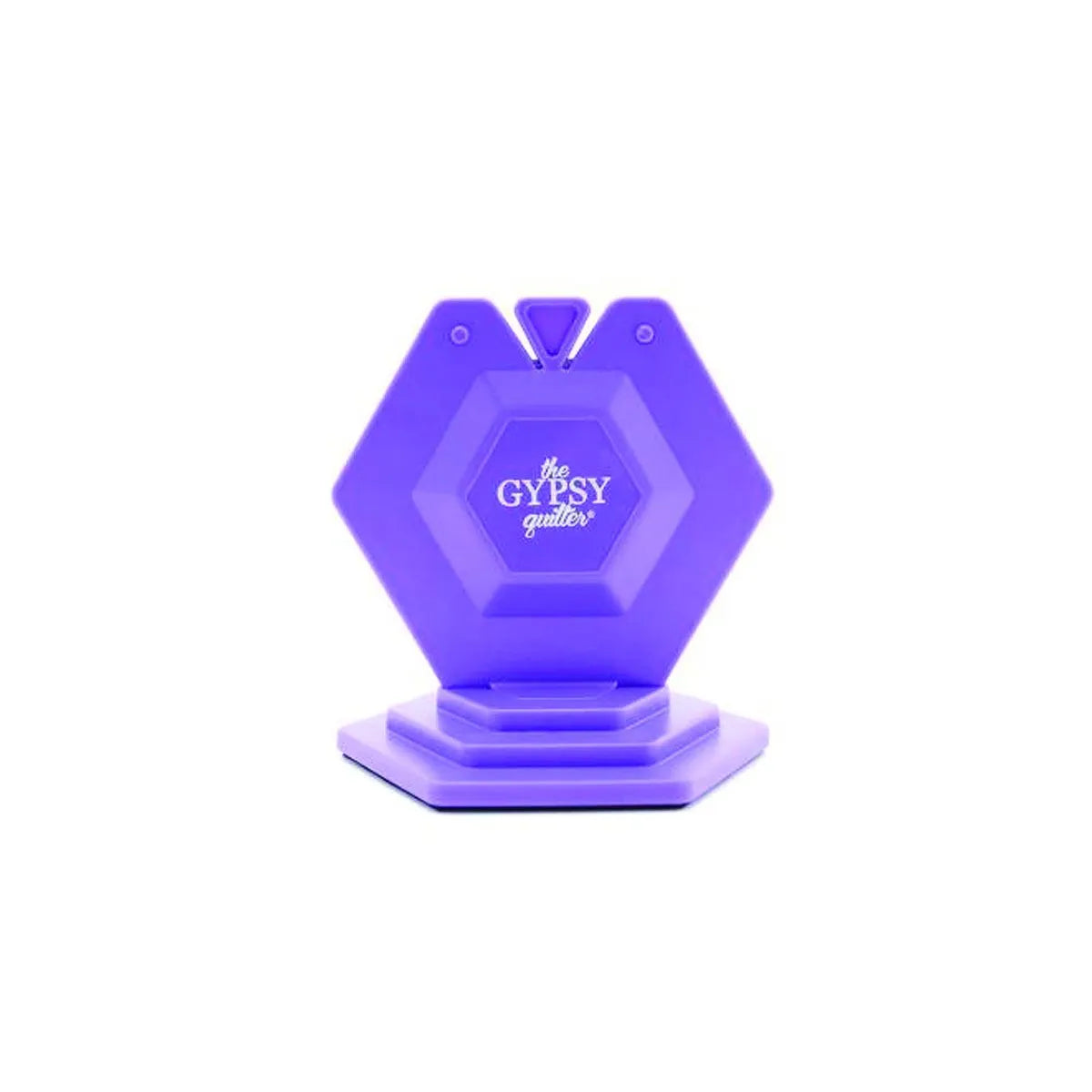 The Chain Piece Thread Cutting Gizmo by Tacony Corporation is a purple, hexagon-shaped plastic stand with the brand logo in white, designed as a quilting thread cutter and shown on a plain white background.