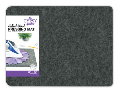 The Checker Distributor Wool Pressing Mat, 17in x 24in x 1/2in thick, is a gray rectangular wool mat perfect for quilting and pressing projects—a reliable go-to for your sewing needs.