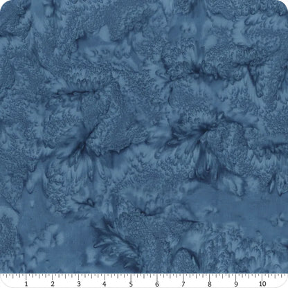 1895 Watercolors Flax Batik 108" Wide 3 Yard Quilt Fabric Back Pack by Hoffman features a textured, marbled design. Includes a ruler at the bottom for scale—ideal for backing your quilt projects.