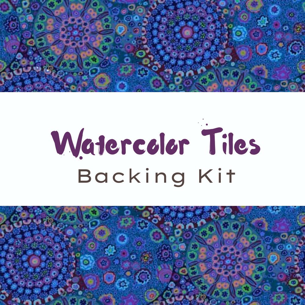 A colorful, kaleidoscopic pattern of blue and purple tiles frames a white center strip with the text “Watercolor Tiles Backing Kit Millefiore Blue” in purple, handwritten-style and typewriter-style fonts.
