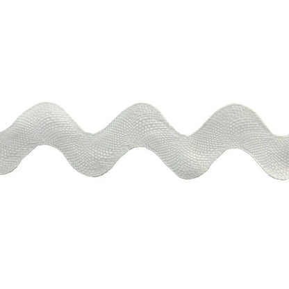 A close-up of Rick Rack 1-1/4" Wide, a white wavy ribbon with a textured surface, shown on a plain background—ideal for adding decorative flair to crafts or garment sewing projects.
