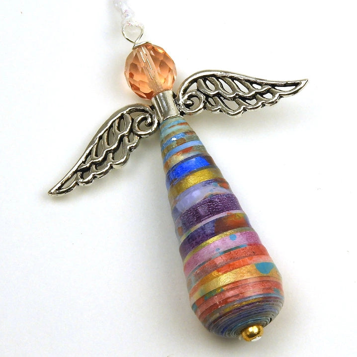 The Angel Ornament Hand Painted by Allison Lake features silver wings, an orange faceted bead head, and a multicolored teardrop paper body—ideal for anyone seeking unique holiday ornaments or vibrant Christmas decor. Brand: Allison Lake.