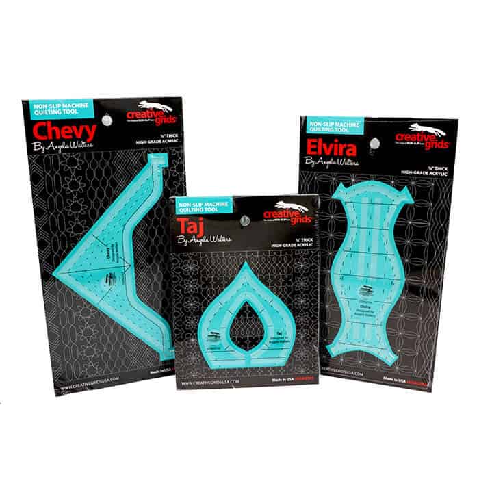 Three blue acrylic quilting rulers labeled Chevy, Taj, and Elvira by Angela Walters are displayed upright in black packaging with white patterns and branding from Creative Grids.