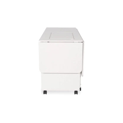 The Arrow Christa Sewing and Quilting Machine Cabinet by Arrow Companies, LLC is a white, foldable table with drop-leaf design, wheels for easy movement, and storage—ideal as a sewing cabinet or flexible workspace.