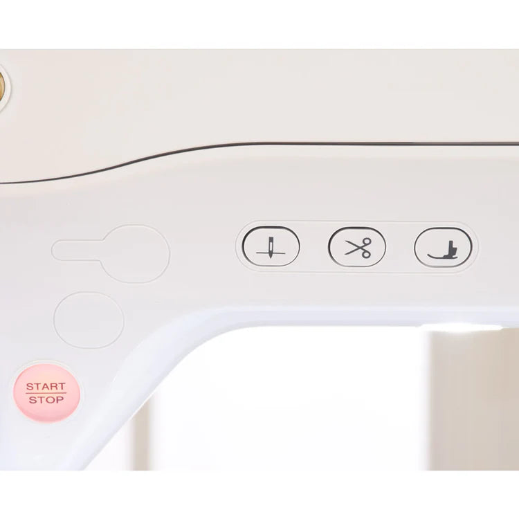 Close-up of the Baby Lock Flare Dedicated Embroidery Machine with FREE Online Classes shows its control panel featuring three black icons and a pink START STOP button—ideal for customizing projects with embroidery fonts.