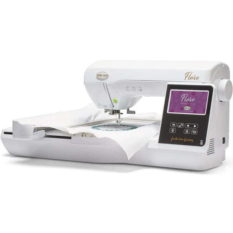 The Baby Lock Flare Dedicated Embroidery Machine with FREE Online Classes features a digital touchscreen display and an embroidery hoop with white fabric—ideal for exploring various embroidery fonts. Brand: Baby Lock.