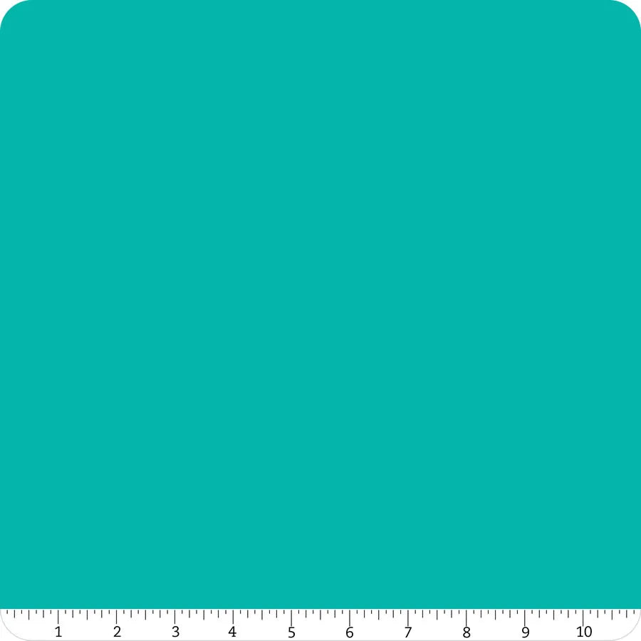 A teal square with rounded corners fills the image. A white ruler marked 0–10 inches spans the bottom—perfect for displaying Riley Blake Confetti Cotton™ Mermaid Tail Solid Fabric, ideal for quilting and cotton projects.