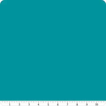A square swatch of Riley Blake Confetti Cotton™ Paradise Solid fabric with rounded corners is shown. A white ruler runs along the bottom edge, marked 1 to 10 inches, to show scale. Ideal for quilting and cotton fabric projects.