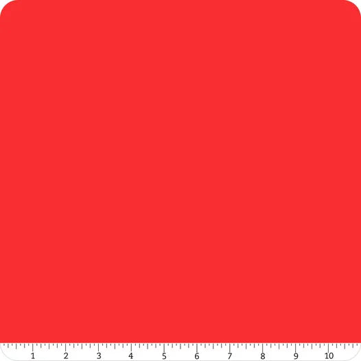 A square swatch of Riley Blake Confetti Cotton™ Tomato Fabric Yardage, bright red with slightly rounded corners. A ruler along the bottom edge shows measurements from 0 to 10 inches, indicating the scale of this premium quilting cotton.
