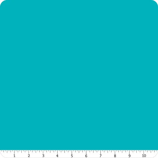 A square swatch of Riley Blake Confetti Cotton™ Turquoise Fabric Yardage with rounded corners. A white ruler at the bottom measures 1 to 10 inches. Made from premium cotton, perfect for quilting or sewing projects.