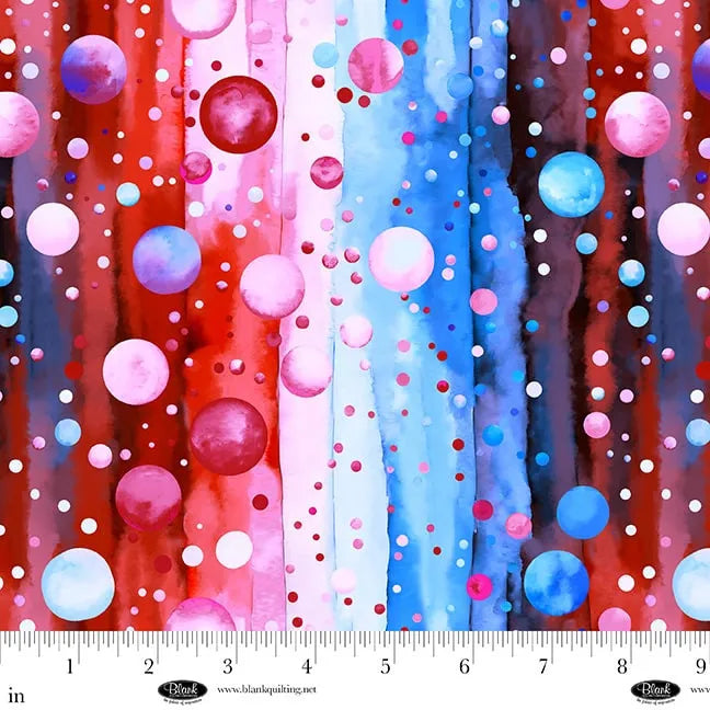 The Jaftex - Blank Quilting Bubble Pops Red and Blue 108" Wide 3 Yard Quilt Fabric Back Pack features a colorful abstract pattern of pink, red, blue, and white circles on striped backgrounds with an inch ruler for scale—perfect for quilt backing.