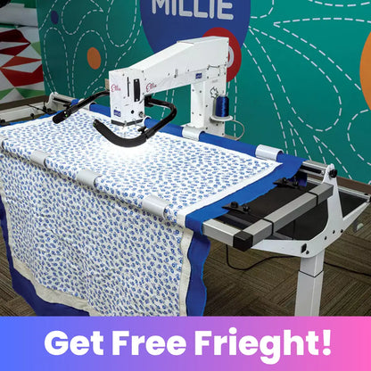 The APQS Ellie 18" Long Arm Quilting Machine works on a blue-and-white patterned quilt against a colorful background with stitched lines and "ELLIE" visible; text below reads Get Free Freight!.