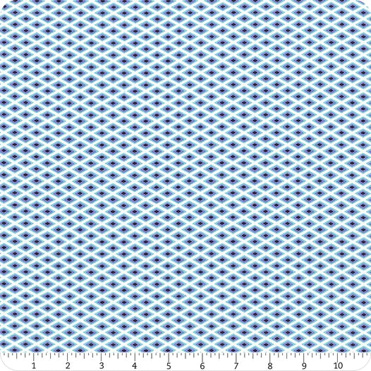 Close-up of evenly spaced blue and white diamond pattern on Floral Reef Marine Lighthouse Windows Fabric Yardage by Jaftex - FreeSpirit, ideal for quilting projects. A ruler below marks inches 1 to 12.