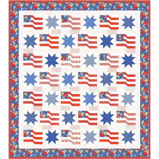 The For Rosie Quilt Class by Quilted Joy features a patriotic design with alternating blue stars and stylized American flags, red and blue borders, and floral accents—ideal as a timeless heirloom quilt.