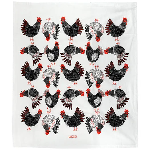 The United Notions Gingiber Tea Towel Chicken is a whimsical flour sack cotton tea towel featuring 25 black and white chickens with red combs in a grid, classic Gingiber style, and "GINGIBER" printed at the bottom center.