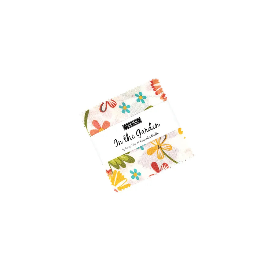 A square fabric swatch with a vibrant floral pattern in red, orange, yellow, and blue from the In The Garden Mini Charm Pack by United Notions—ideal for adding color to your next quilting or sewing project.