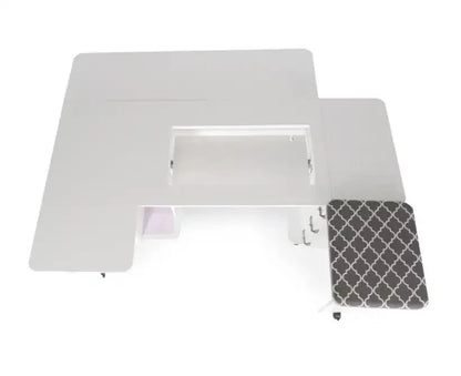 Overhead view of the Kangaroo Sydney Sewing Cabinet with Electric Lift by Arrow Companies, LLC, featuring a central recessed sewing machine area, attached patterned ironing board, and a storage compartment below.