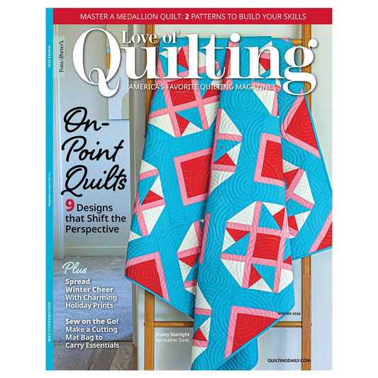 The Autographed Love of Quilting Magazine Winter 2026 by Golden Peak Media showcases a blue and red Meadow Whirl Quilt on the cover, with headlines highlighting quilt patterns, winter decor ideas, and sewing projects.
