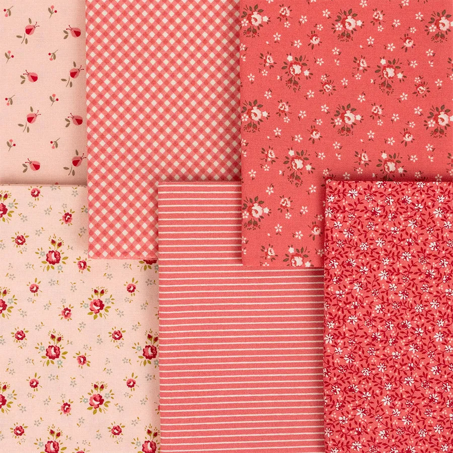 Six Lyda Rose Mini Charms by United Notions in pink prints—each with unique patterns: small flowers, gingham check, tiny floral clusters, floral sprigs, narrow stripes, and dense small flowers.