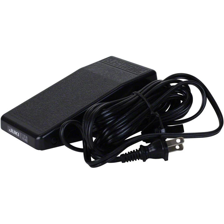 A black Juki America sewing machine foot pedal with a textured surface and long coiled cord is shown—ideal for use with the Juki Pearl Line MO-655 2/3/4/5 Thread Serger.
