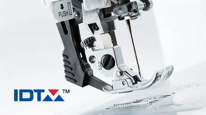 A close-up of the SVP Pfaff Passport 2.0 compact sewing machine foot and needle, highlighting detailed metal parts and a PUSH label beside the blue and red IDT™ logo.