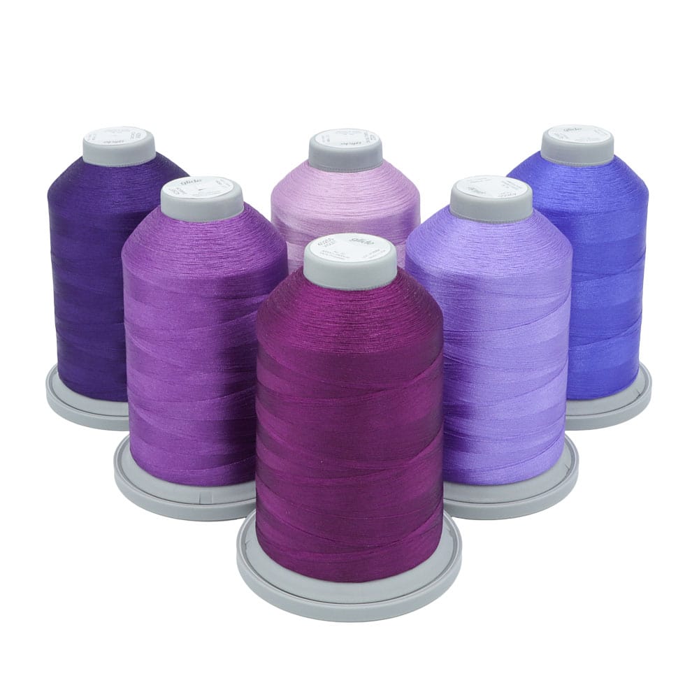 Glide Thread Color Block Bundle - Purple - six cones of purple Glide thread on a white background