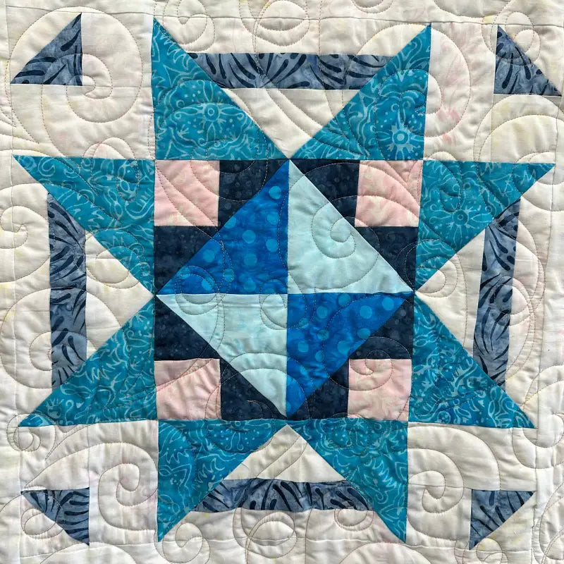 A quilt block sewn during a Quilted Joy test drive