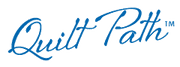 Quilt Path logo in blue, cursive script font with a trademark symbol on a light background.