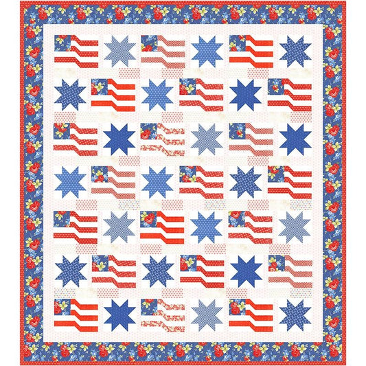 The Rosie Quilt Kit by United Notions features blue stars and red-and-white flag blocks with blue star fields in Rosie fabric, bordered by a blue floral pattern for a classic Americana look.