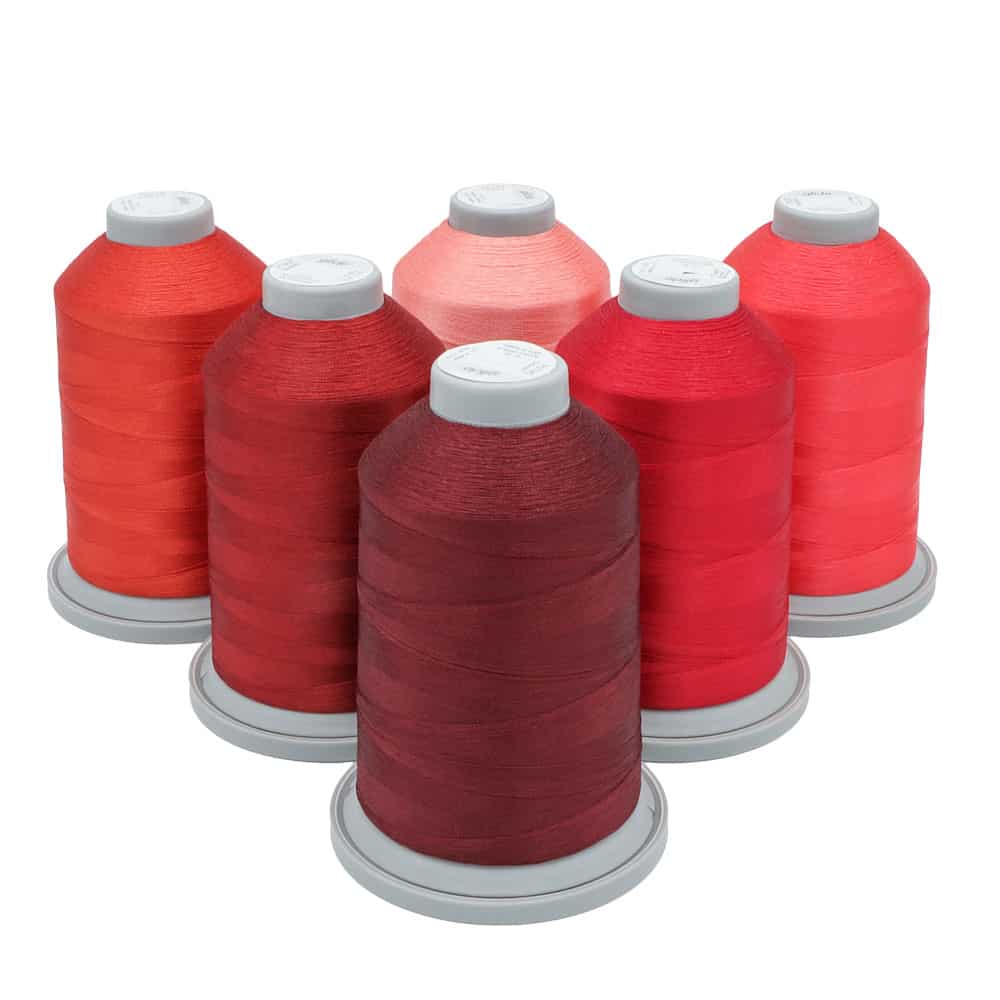 Glide Thread Color Block Bundle - Red - six cones of red Glide thread on a white background