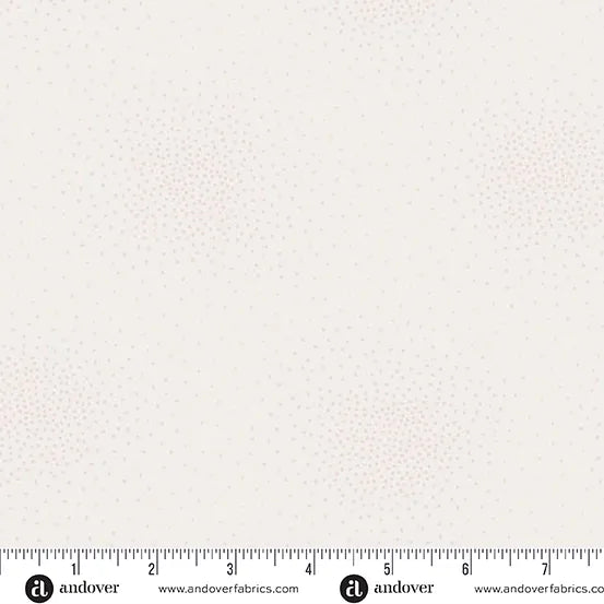 Spritz Crystal Fabric Yardage by Andover features a cream color with subtle dotted clusters. Inches are marked on a ruler at the bottom, with "Andover" printed on the lower border.