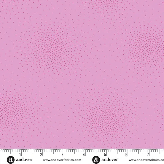 Spritz Pink Carnation Fabric Yardage by Andover features clusters of small, evenly spaced darker pink dots in subtle circular patterns. A measuring ruler along the bottom edge provides fabric scale.