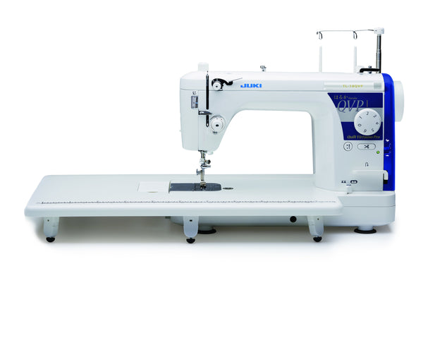 The JUKI Haruka TL-18QVP straight stitch sewing and quilting machine with its extension table fitted, photographed on a white background.