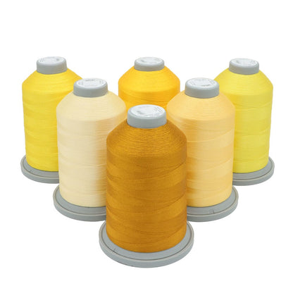 Glide Thread Color Block Bundle - Yellow - six cones of yellow Glide thread on a white background