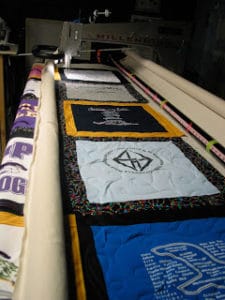 Male High School t-shirt quilt, quilted by Angela Huffman