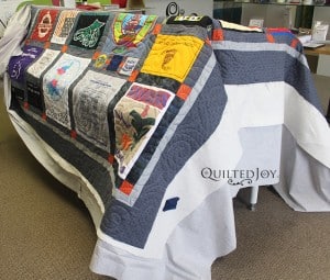 Joanne's Travel Shirts Quilt, quilted by Angela Huffman
