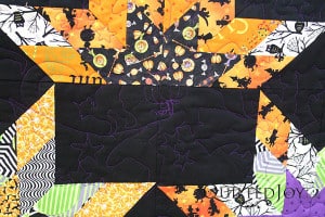 Polly designed her own Halloween pantograph for this quilt - QuiltedJoy.com