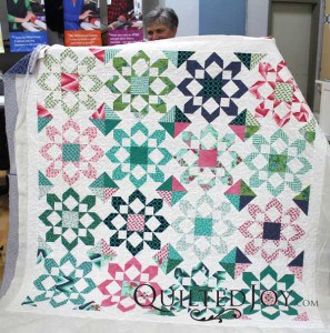 Colleen made this quilt with Thimble Blossom's Fireworks quilt pattern and Moda's Color Me Happy fabric collection
