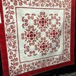 Red December by Gail H. Smith and Angela McCorkle at AQS Quilt Week Paducah 2016