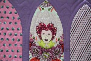 Longarm quilter Angela Huffma outlined Queen Elizabeth's face so that the design of the fabric did all of the talking.
